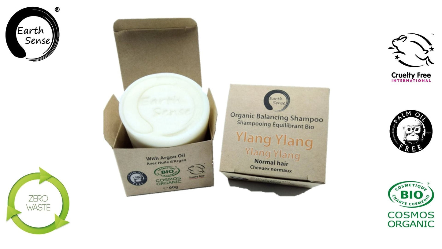 Organic shampoo bar in a cardboard box with Earth Sense branding and sustainability logos.