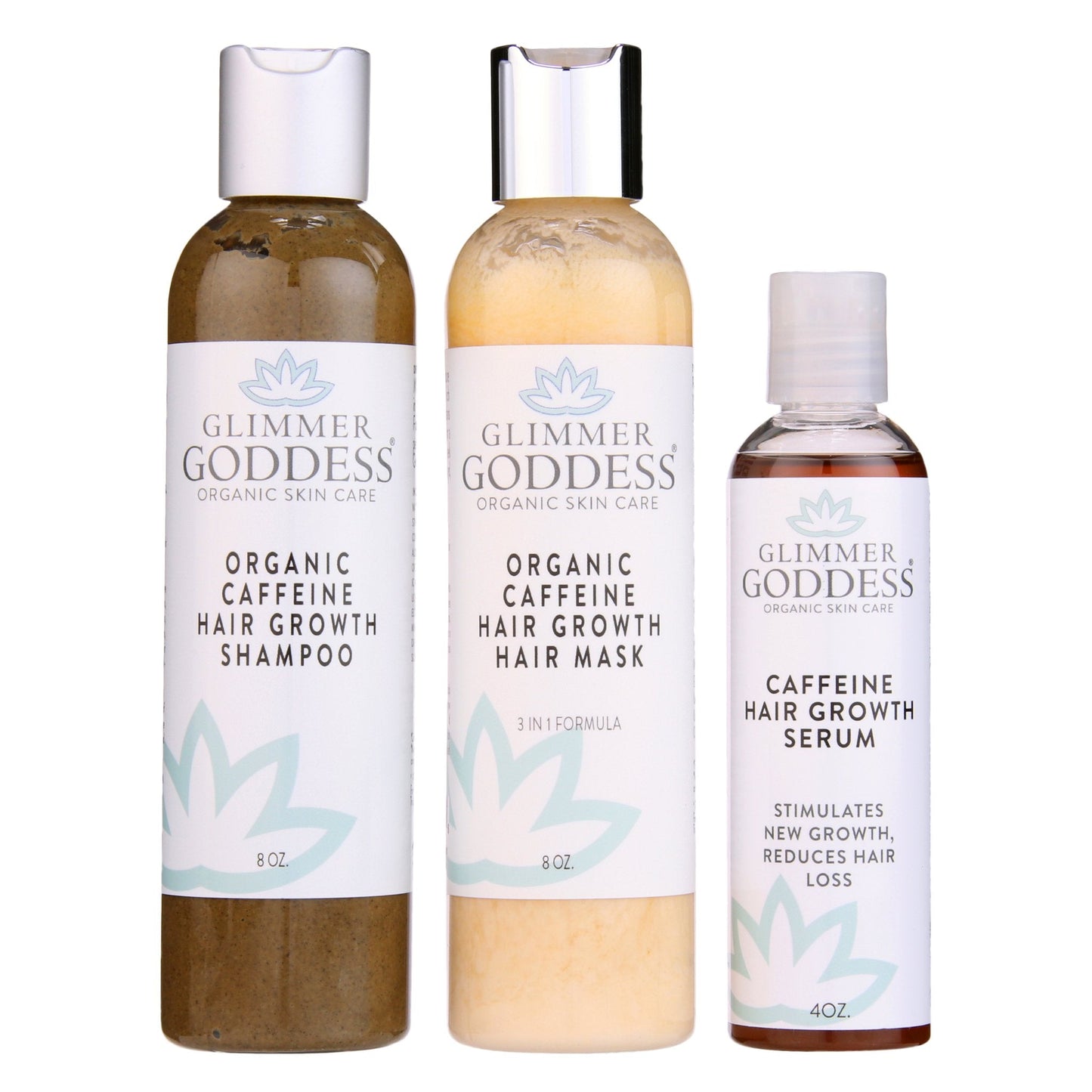 Three bottles of Glimmer Goddess organic skin care products on a white background