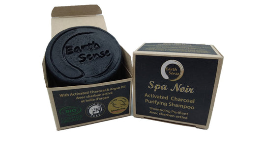 Earth Sense Spa Noir activated charcoal shampoo bar with packaging on a white background